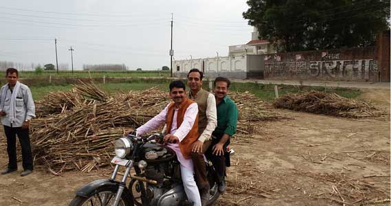On a bullet going to Chaudhary saab's house with Ch. Bhagat Singh Tomar and Mr. Amit Rai