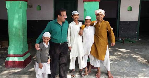 With children of the madarsa at mazaar of Sheikh Badruddin who were all smiles when meeting us.