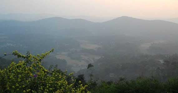 The valley and the Western Ghats stretching in front of Raja's Seat.